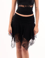 Lace-trimmed skirt with a handkerchief hem